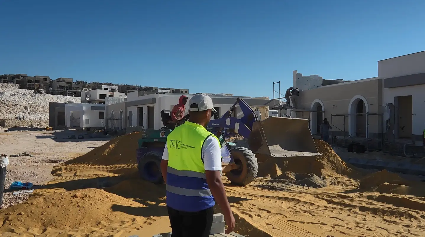 trio Construction team supervising site works and heavy machinery during the development of The Med